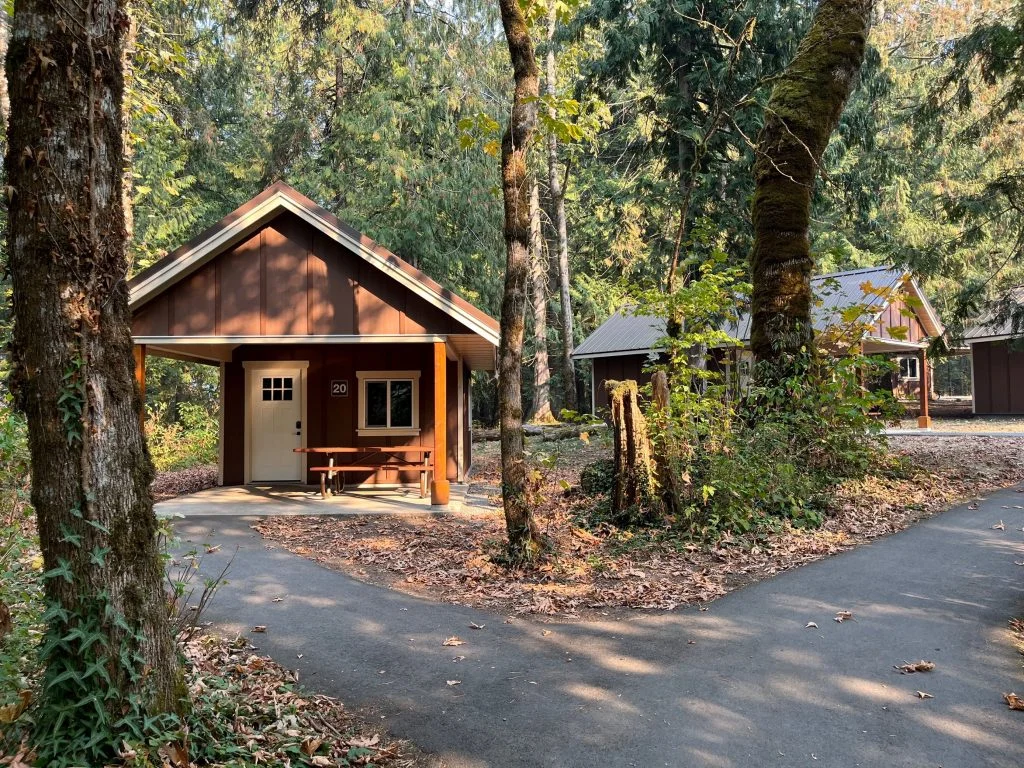 Cozy cabin rental nestled in the trees at Maple Bay, Cultus Lake Provincial Park.